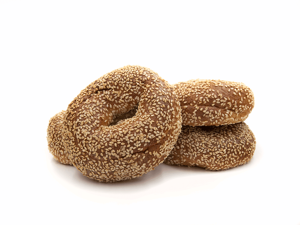 Four Chompie's Low-Carb Sesame bagels stacked
