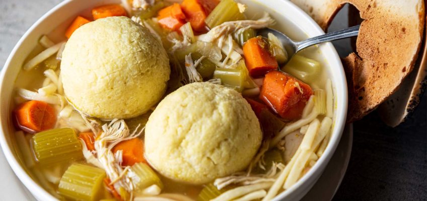 A bowl of kosher matzo ball soup with chicken from Chompie's in Phoenix
